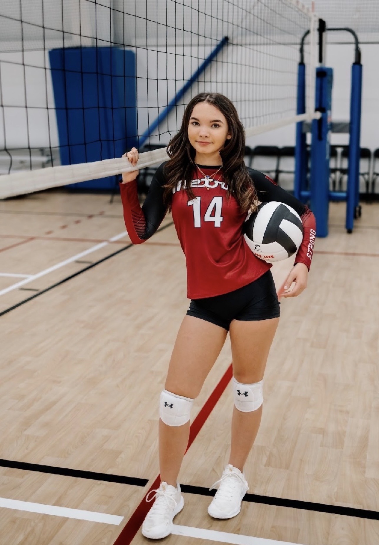 Daughter in her club volleyball uniform