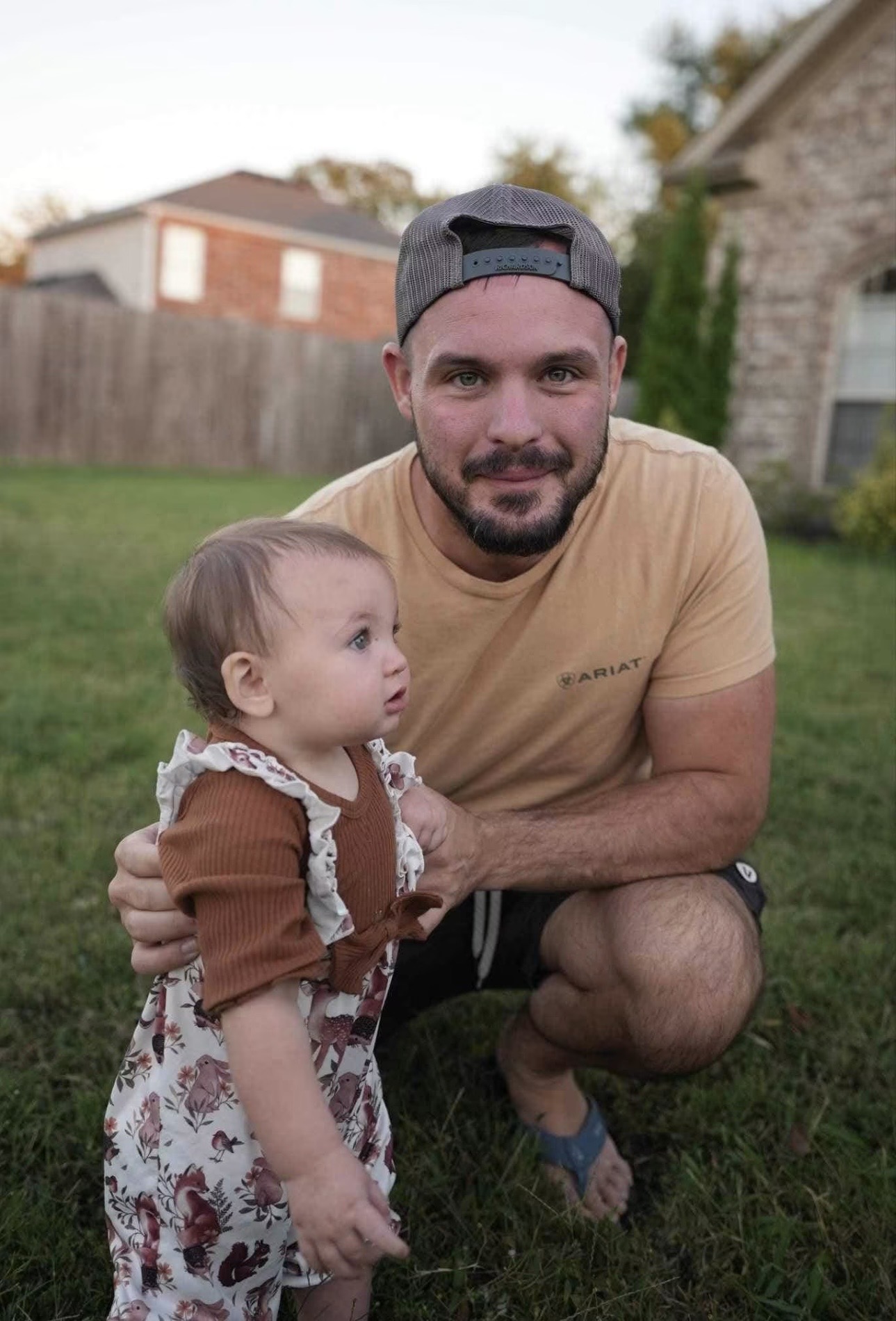 Legacy Homes owner with his youngest daughter in the backyard