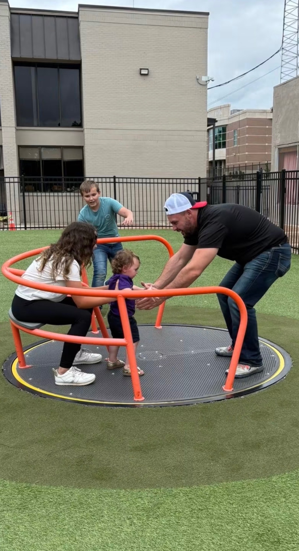 Family playing together at a local Arkansas park